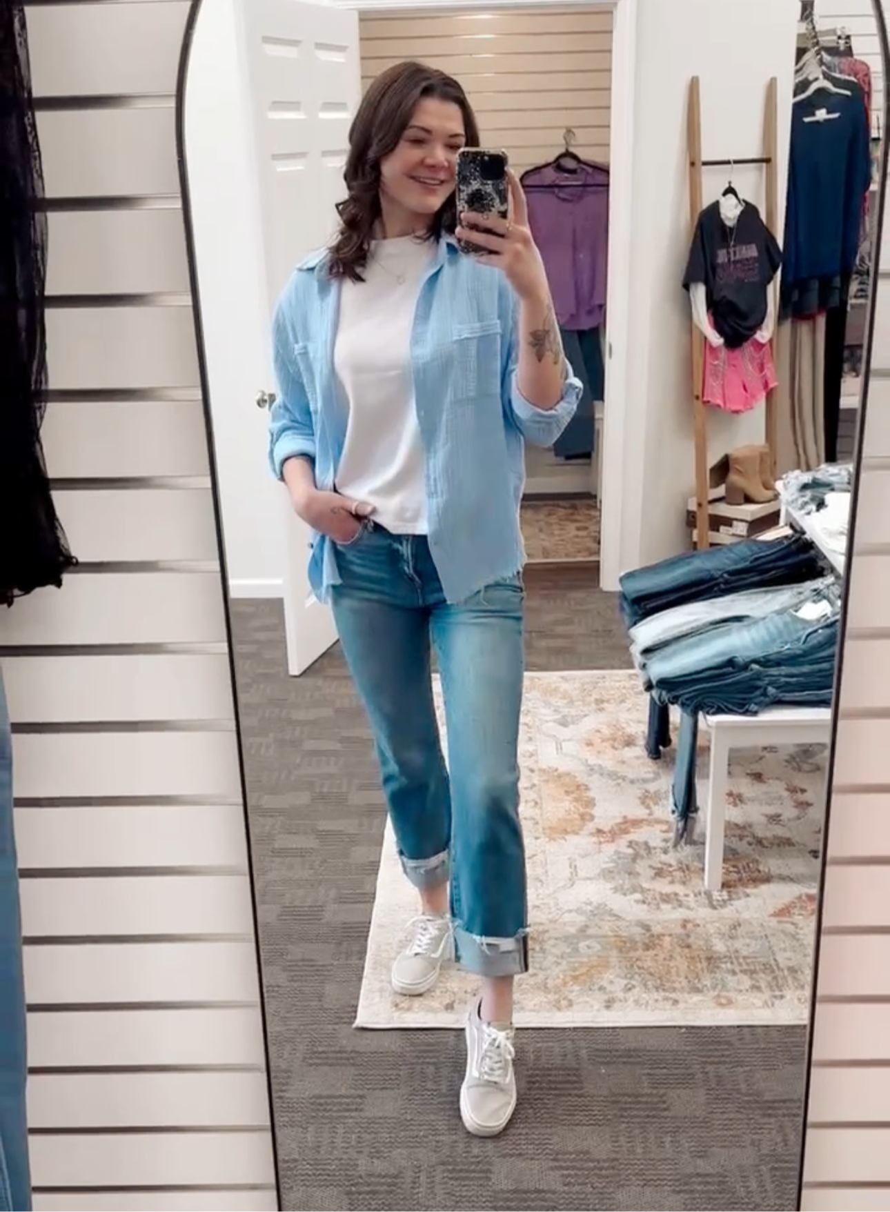 Lightweight and breezy button-down shirt in a soft, crinkled gauze fabric, featured in a fresh Spring Blue. Designed with dual chest pockets, raw-edge hem, and rolled long sleeves with button tabs. Slightly oversized fit for easy layering over tanks, tees, or swimsuits—perfect for casual days, lake life, or cool summer nights.