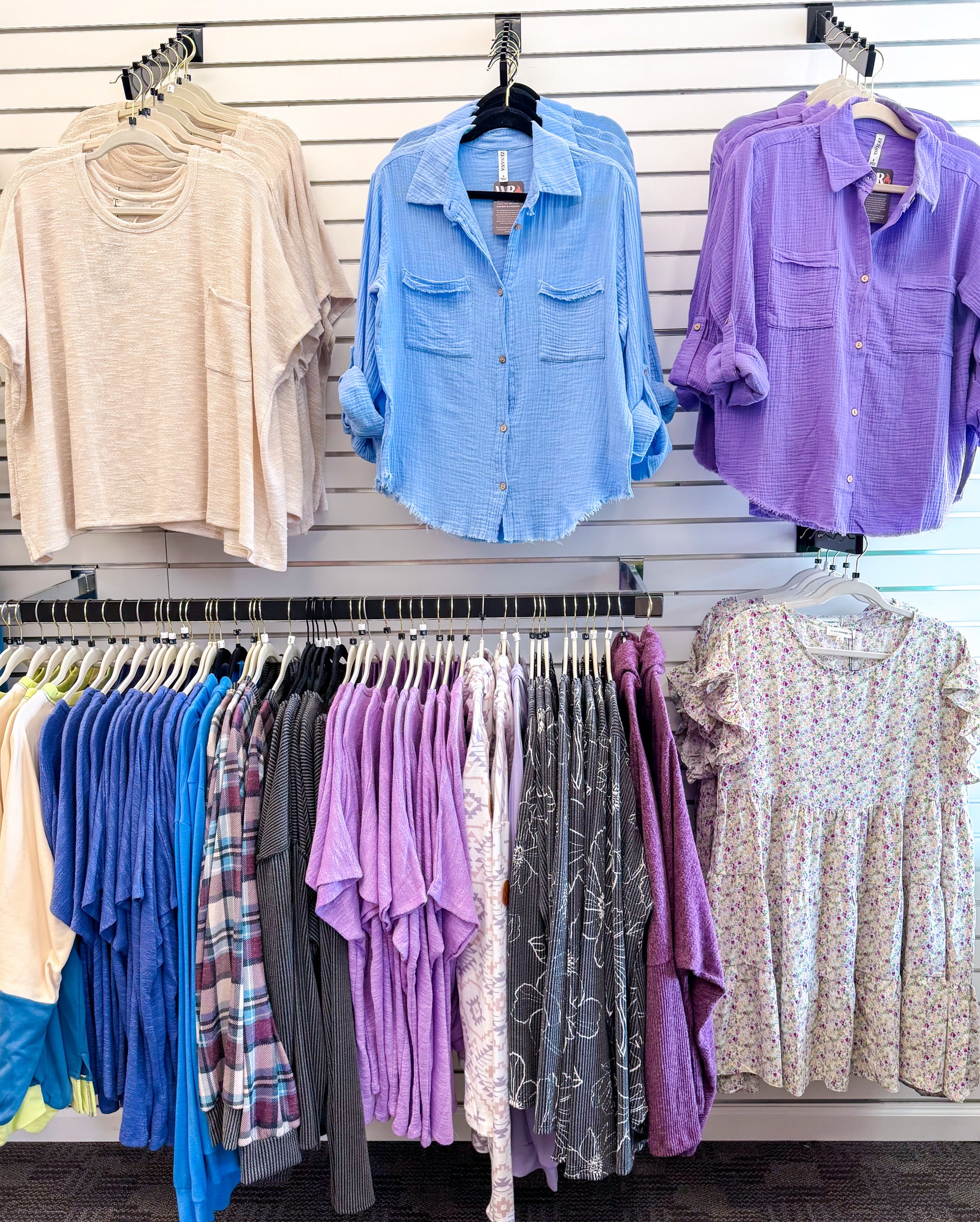 Lightweight and breezy button-down shirt in a soft, crinkled gauze fabric, featured in a fresh Spring Blue. Designed with dual chest pockets, raw-edge hem, and rolled long sleeves with button tabs. Slightly oversized fit for easy layering over tanks, tees, or swimsuits—perfect for casual days, lake life, or cool summer nights.