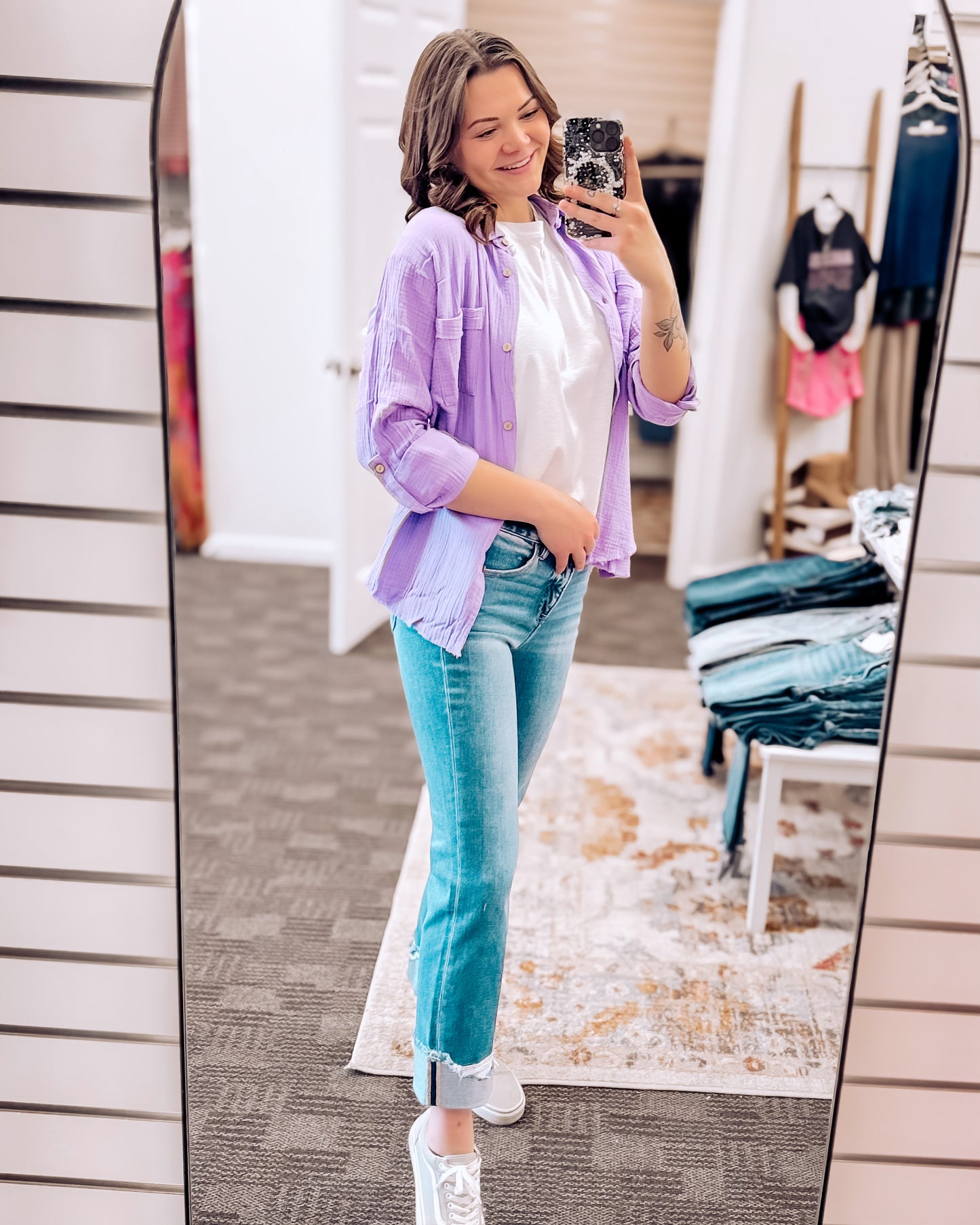 Textured lavender button-down shirt with a relaxed, oversized fit and lightweight gauze fabric. Features raw-edge hems, double chest pockets, wood-look buttons, and roll-tab sleeves. A breezy, versatile layer for spring and summer that pairs effortlessly with denim, tanks, or swimwear.
