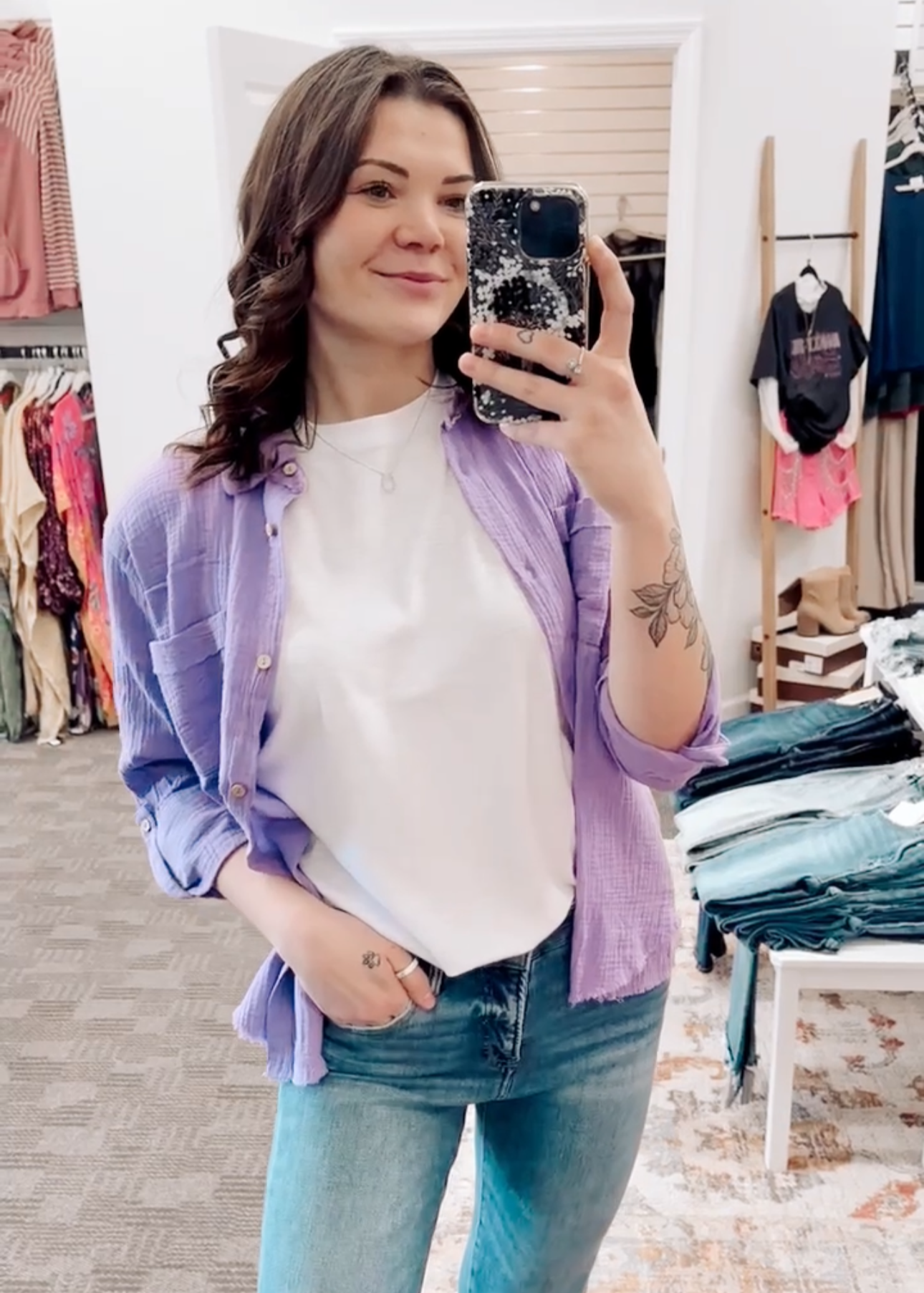 Textured lavender button-down shirt with a relaxed, oversized fit and lightweight gauze fabric. Features raw-edge hems, double chest pockets, wood-look buttons, and roll-tab sleeves. A breezy, versatile layer for spring and summer that pairs effortlessly with denim, tanks, or swimwear.
