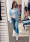 Lightweight and breezy button-down shirt in a soft, crinkled gauze fabric, featured in a fresh Spring Blue. Designed with dual chest pockets, raw-edge hem, and rolled long sleeves with button tabs. Slightly oversized fit for easy layering over tanks, tees, or swimsuits—perfect for casual days, lake life, or cool summer nights.