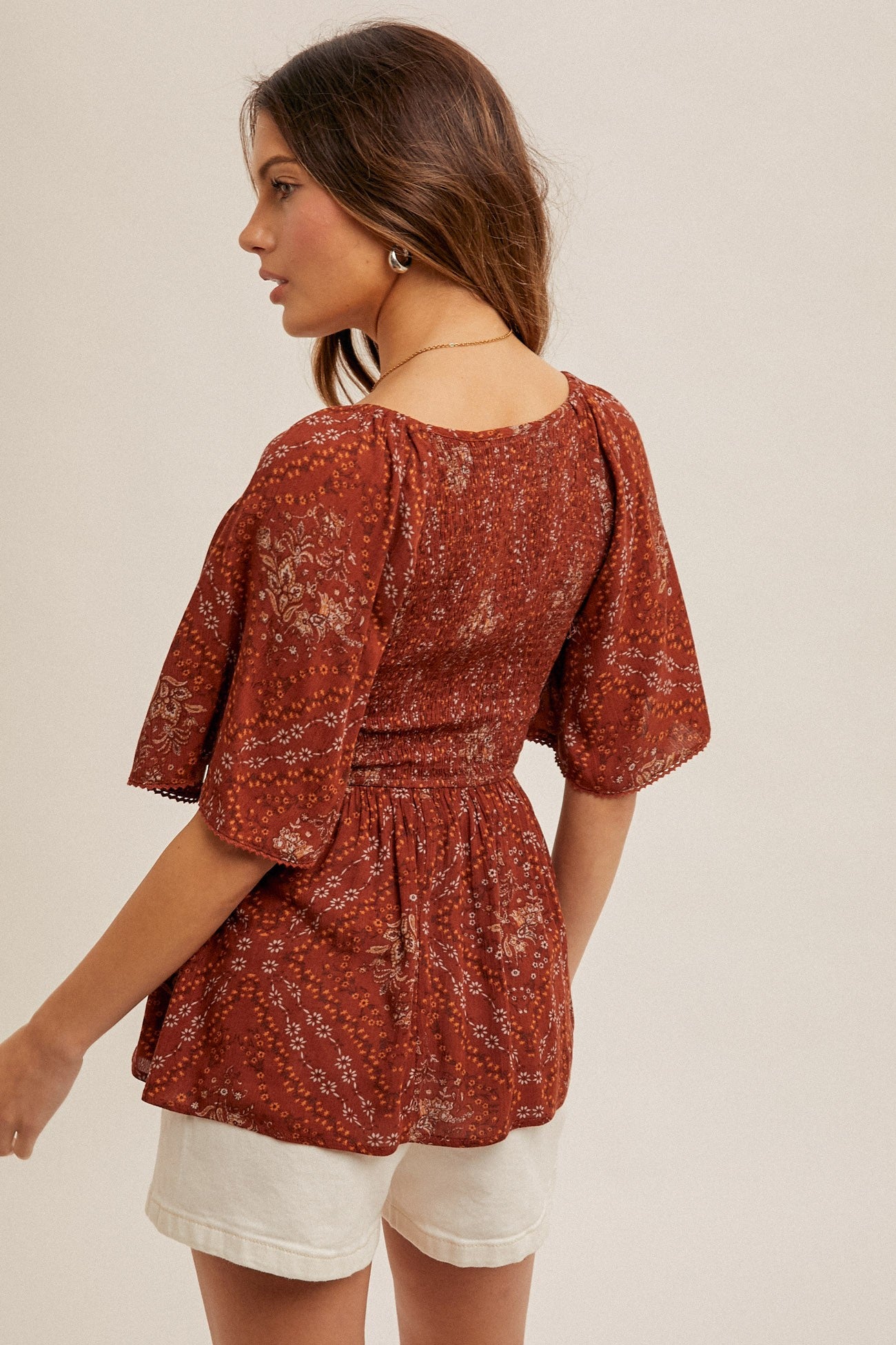 Autumn Floral Smocked Peplum Top | Rust