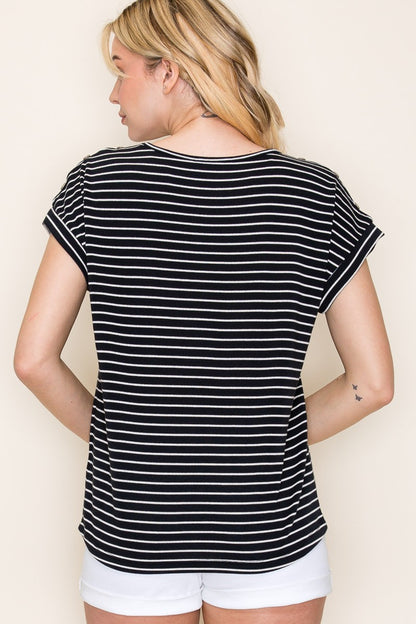 Woman wearing a black short-sleeve top with thin white horizontal stripes, a classic crew neckline, and rolled cuff sleeves with button accents. The top features a relaxed, drapey fit that pairs effortlessly with white cuffed shorts for a crisp, casual look. Perfect for everyday wear, this lightweight striped tee brings timeless style and comfort to your summer wardrobe.