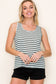 Woman wearing a casual sleeveless tank top with horizontal forest green and white stripes. The top features a scoop neckline and a relaxed, slightly flared silhouette that offers a breezy, comfortable fit. Styled with distressed dark-wash denim shorts, this easygoing look is perfect for everyday wear, beach days, or layering under summer cardigans and jackets.