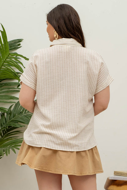 Short-sleeve button-up shirt in a neutral cream and tan stripe pattern, featuring a collared neckline and a chest pocket with horizontal stripe contrast. Lightweight, breathable fabric with a relaxed fit for everyday wear. A versatile top that pairs effortlessly with denim, trousers, or shorts for a casual yet polished look.