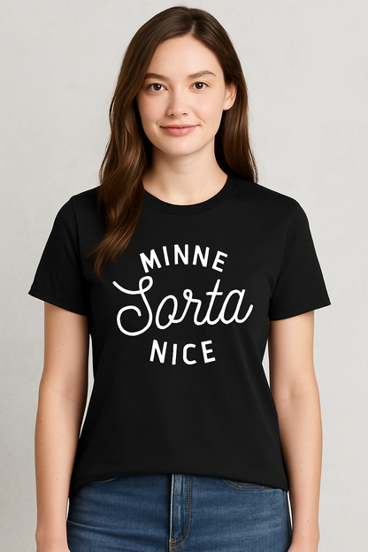 Black short-sleeve crewneck tee featuring bold white text that reads “MINNE Sorta NICE” in a mix of block and script fonts. Made from a soft, lightweight cotton blend with a relaxed unisex fit. A cheeky nod to Minnesota culture—equal parts charm and sass. Perfect for layering or wearing solo with jeans and sneakers for a casual Midwest-cool vibe.